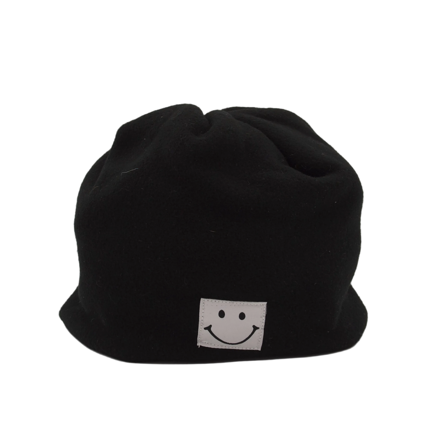 Black beanie with a white smiley face logo on a light gray background